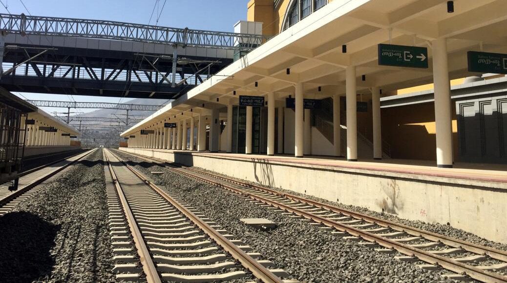 Railway platform and freight tracks at a regional station